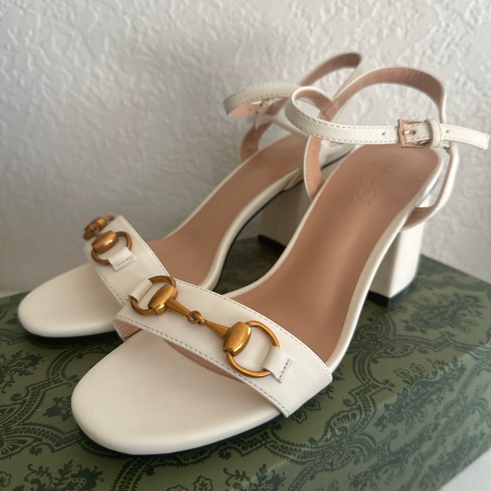 Elegant White Sandals with Gold Accents